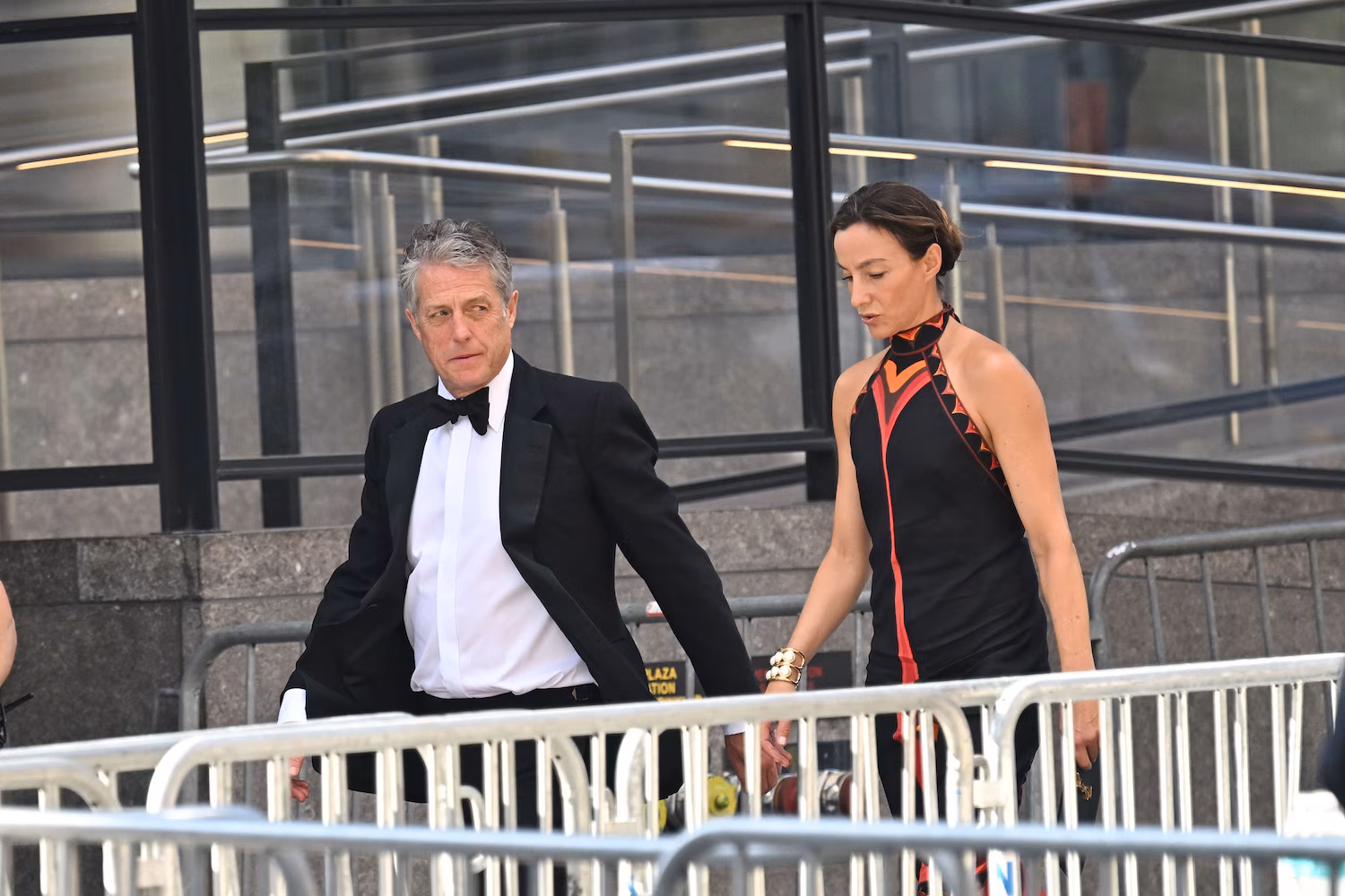Hugh Grant and Anna Elisabet Eberstein arrive at Madison Square Garden on July 3, 2026 in New York City.